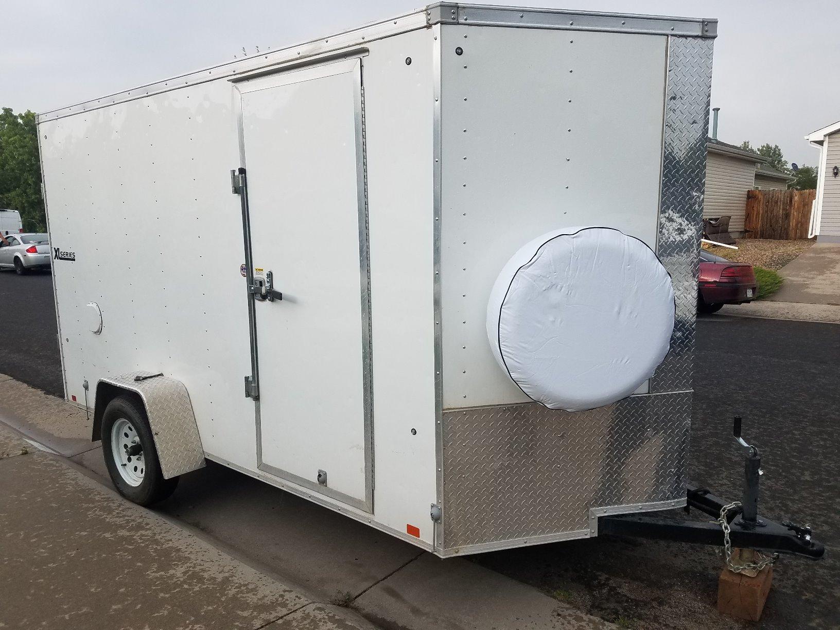 Camco Camper/RV Tire Cover | Crafted of Heavy-Duty Arctic White Vinyl & Fits 29-Inch Wheels | Great for Covering Spare Tires During Travel, RV Storage and Organization, and More (45344) customer photo 1