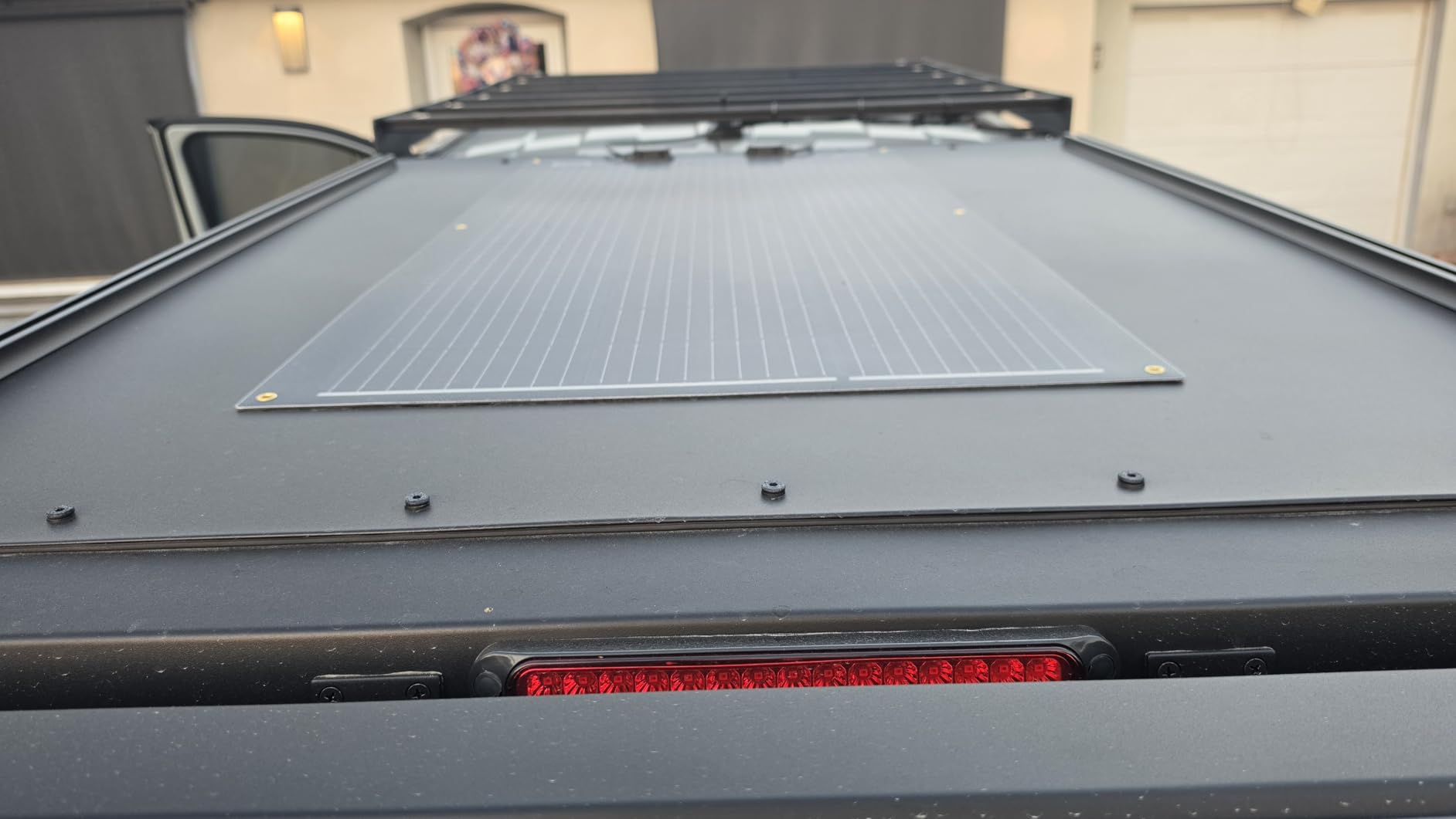 Renogy 100W Solar Panel 12V, Flexible Solar Panel 100 Watt 22% High-Efficiency, 240 Degree Ultra Lightweight Solar Panels for Marine RV Cabin Van Car Boat Camping Curve Surfaces, Black customer photo 1