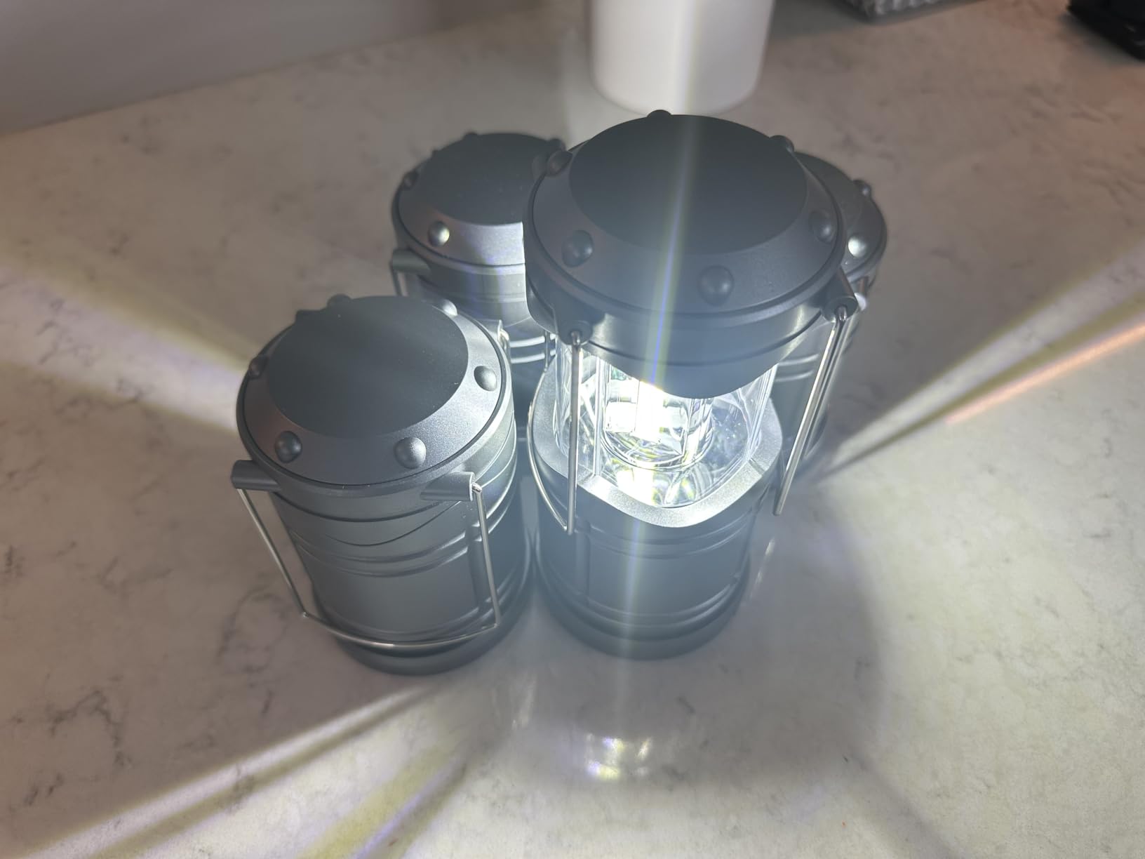 Lichamp LED Camping Lantern, 4 Pack Battery Powered Flashlight for Power Outages, Portable Collapsible Hanging Light Essential for Home, Outdoor, Emergency Lamp Survival Kit Gear for Hurricane, Gray customer photo 1