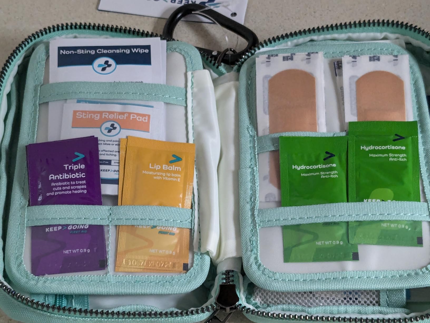 KeepGoing Travel First Aid Kit - TSA-Approved Travel Size | First Aid Kit for Car, Hiking, Camping & Outdoor Emergencies, Stain and Water-Resistant Case customer photo 1