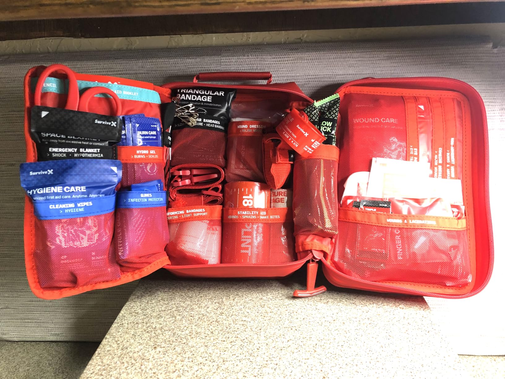 SurviveX Waterproof First Aid Kit, Emergency Kit for 4-5 People | Submersible up to 3ft, Labeled Pockets, Quick access, Mountable, First aid for boats, kayaks, camping, hiking, outdoors customer photo 1