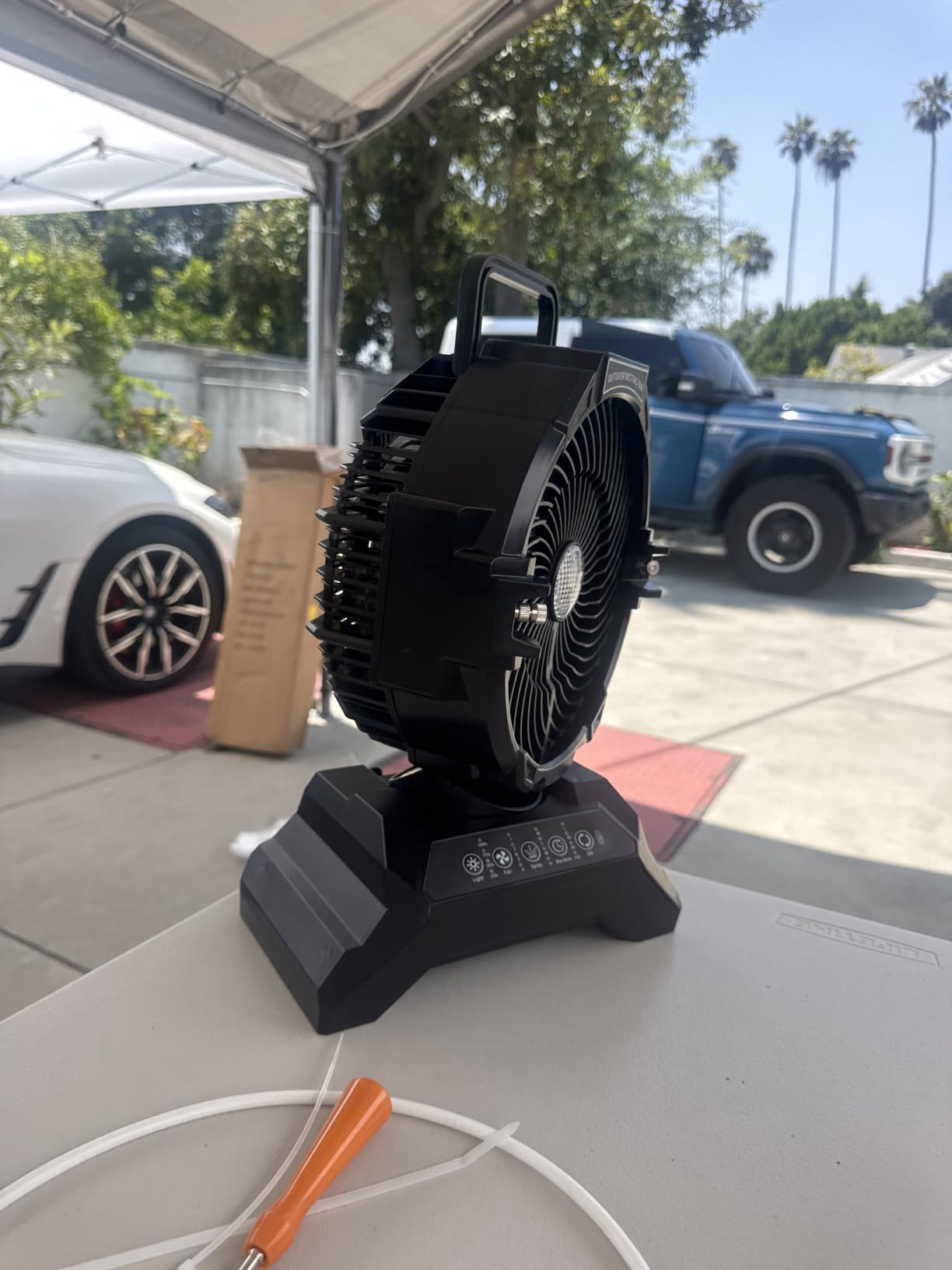 Portable Misting Fan for Outside, 70Hrs Camping Mister Fan,15L Cooling Fan with Remote, Ice Fan with 4 Spray Speeds,4 Misting Modes,3 Light Modes for Garden/Camping/Party/Fishing customer photo 2