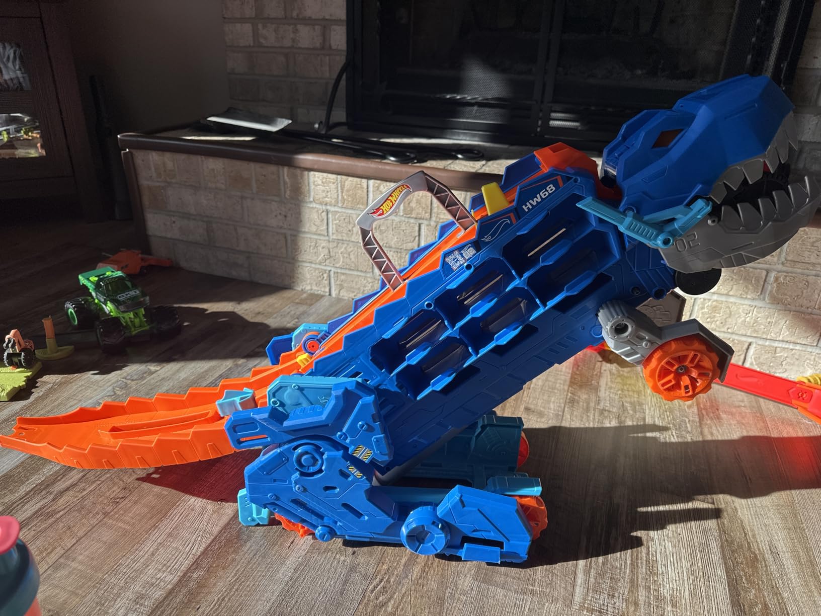 Hot Wheels City Toy Car Track Set, Ultimate T-Rex Transporter, Hauler Transforms into Stomping Dino with Race Track, from Netflix Series “Let’s Race” customer photo 2